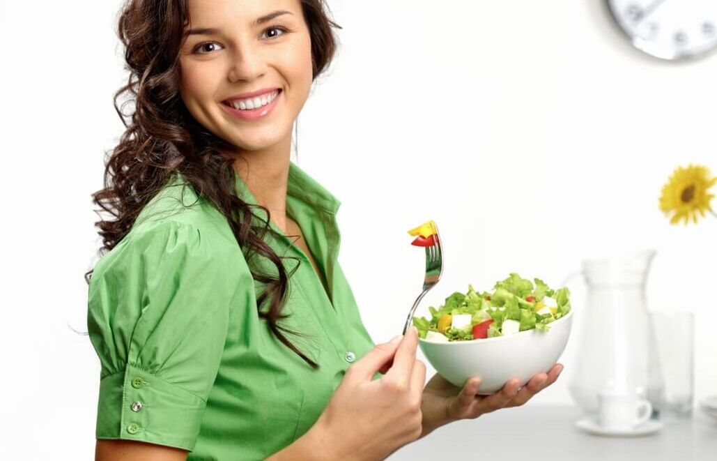 girl who eats vegetable salad on a diet with 6 petals